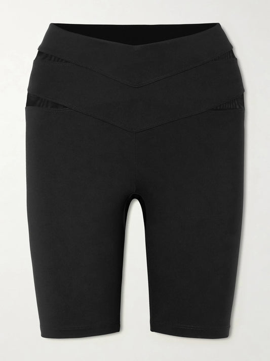 Image of a model wearing Shorts. Product name - Lonsbrough Tulle-paneled Stretch-jersey Shorts in Black colour by brand - Eres