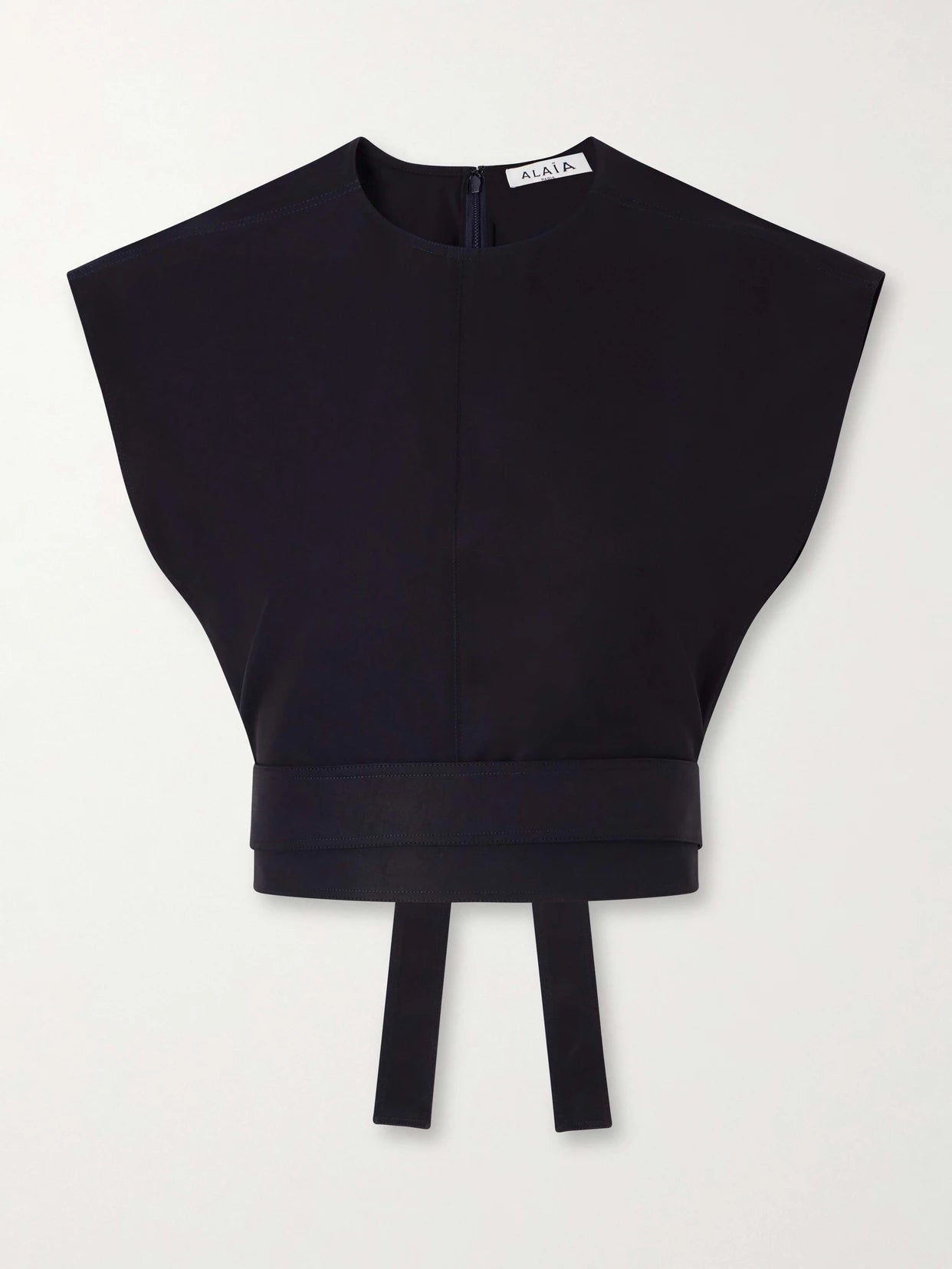 Image of a model wearing Tops. Product name - Belted Cropped Cotton-gabardine Top in Navy colour by brand - Alaïa