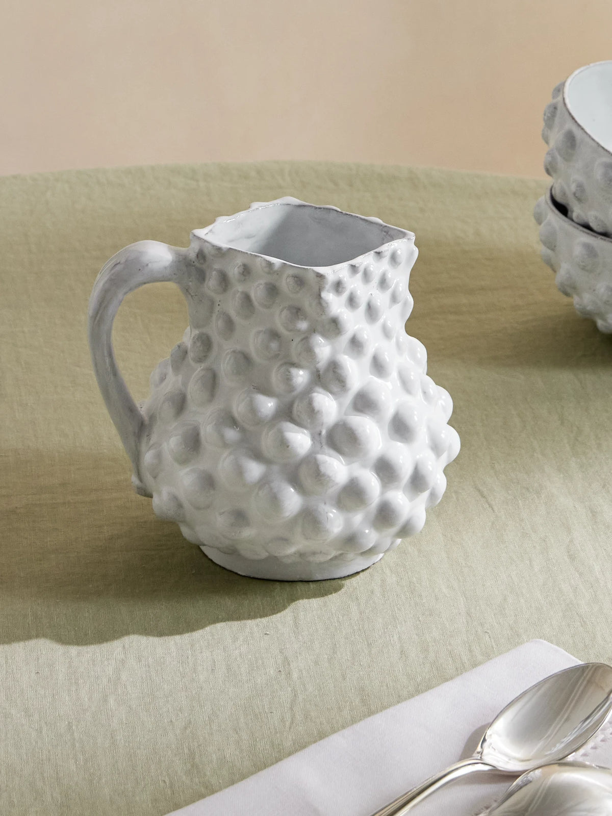 Image of Tableware. Product name - Adélaïde Glazed Ceramic Pitcher in White colour by brand - Astier De Villatte