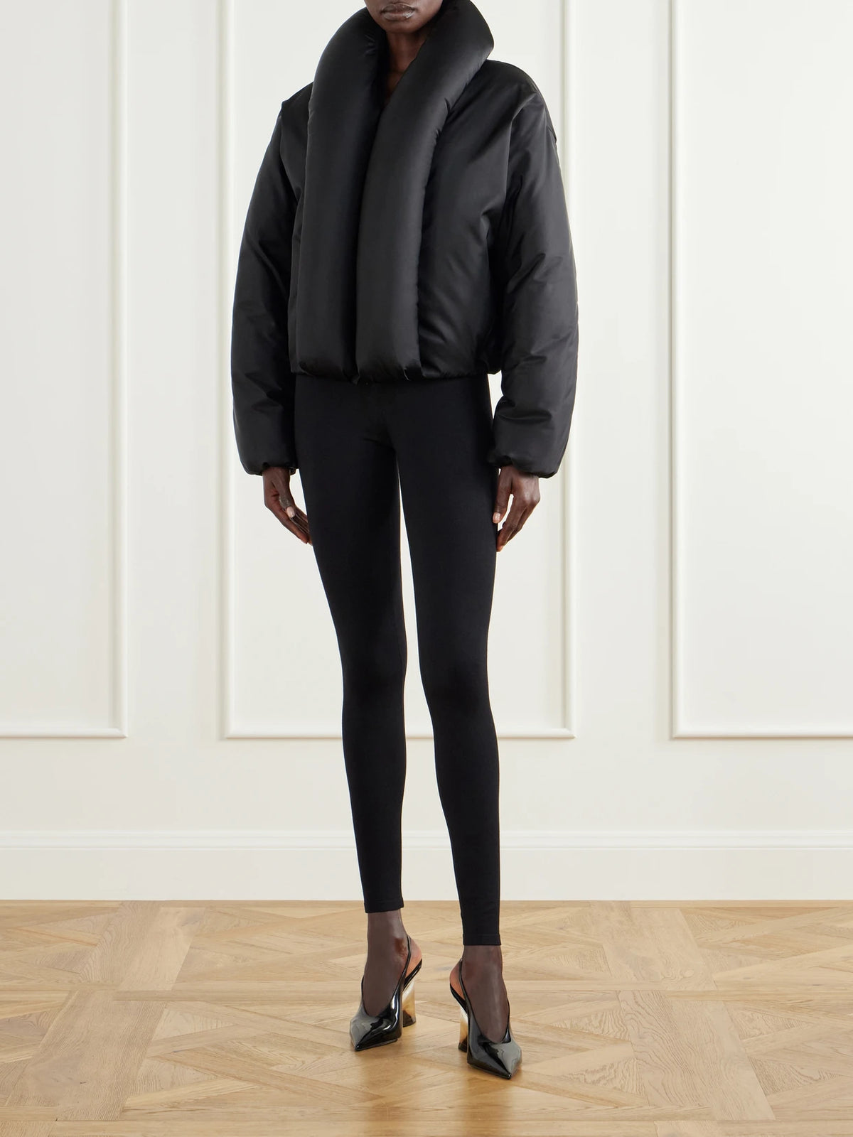 Image of Coats & Jackets. Product name - Padded Shell Bomber Jacket in Black colour by brand - Alaïa
