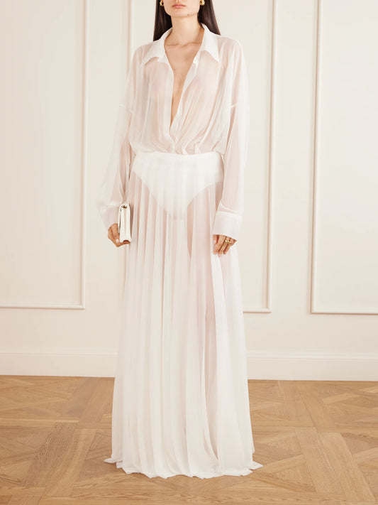 Image of a model wearing Skirts. Product name - Tulle Maxi Skirt in White colour by brand - Norma Kamali