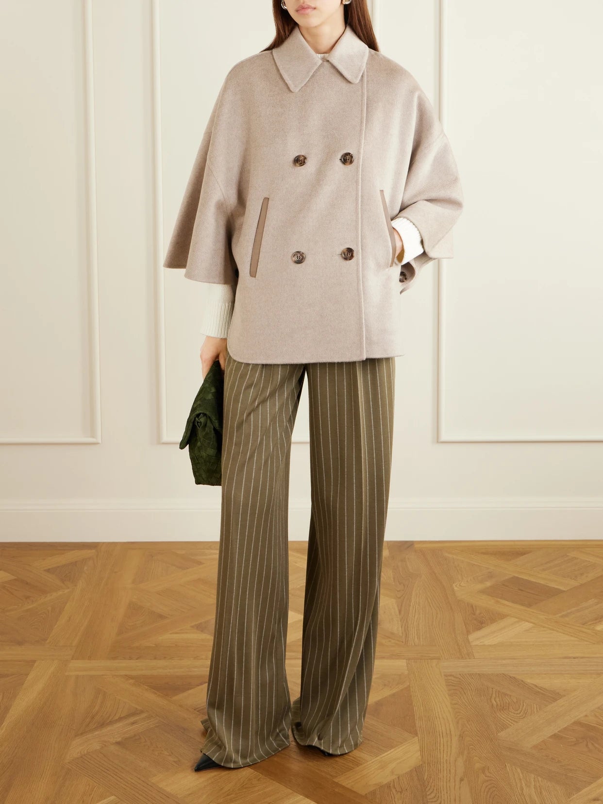 Image of a model wearing Pants. Product name - Striped Pleated Jersey Wide-leg Pants in Army green colour by brand - Max Mara