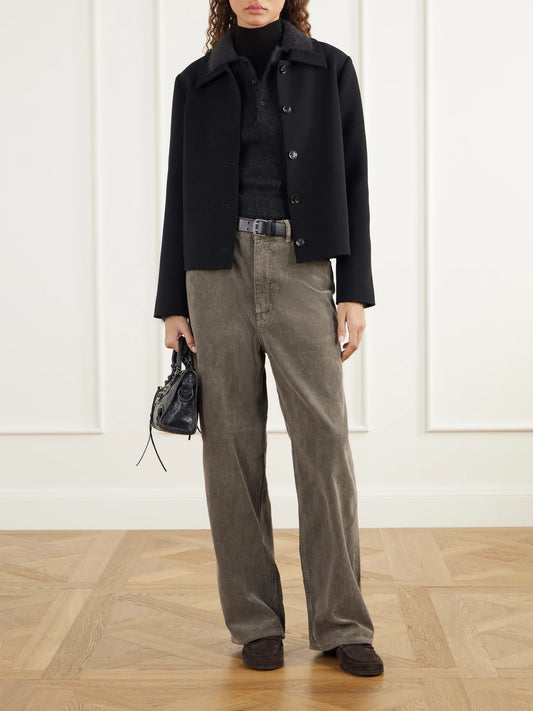Image of a model wearing Outerwear. Product name - Brushed Mohair And Wool-blend Polo Sweater in Black colour by brand - Auralee