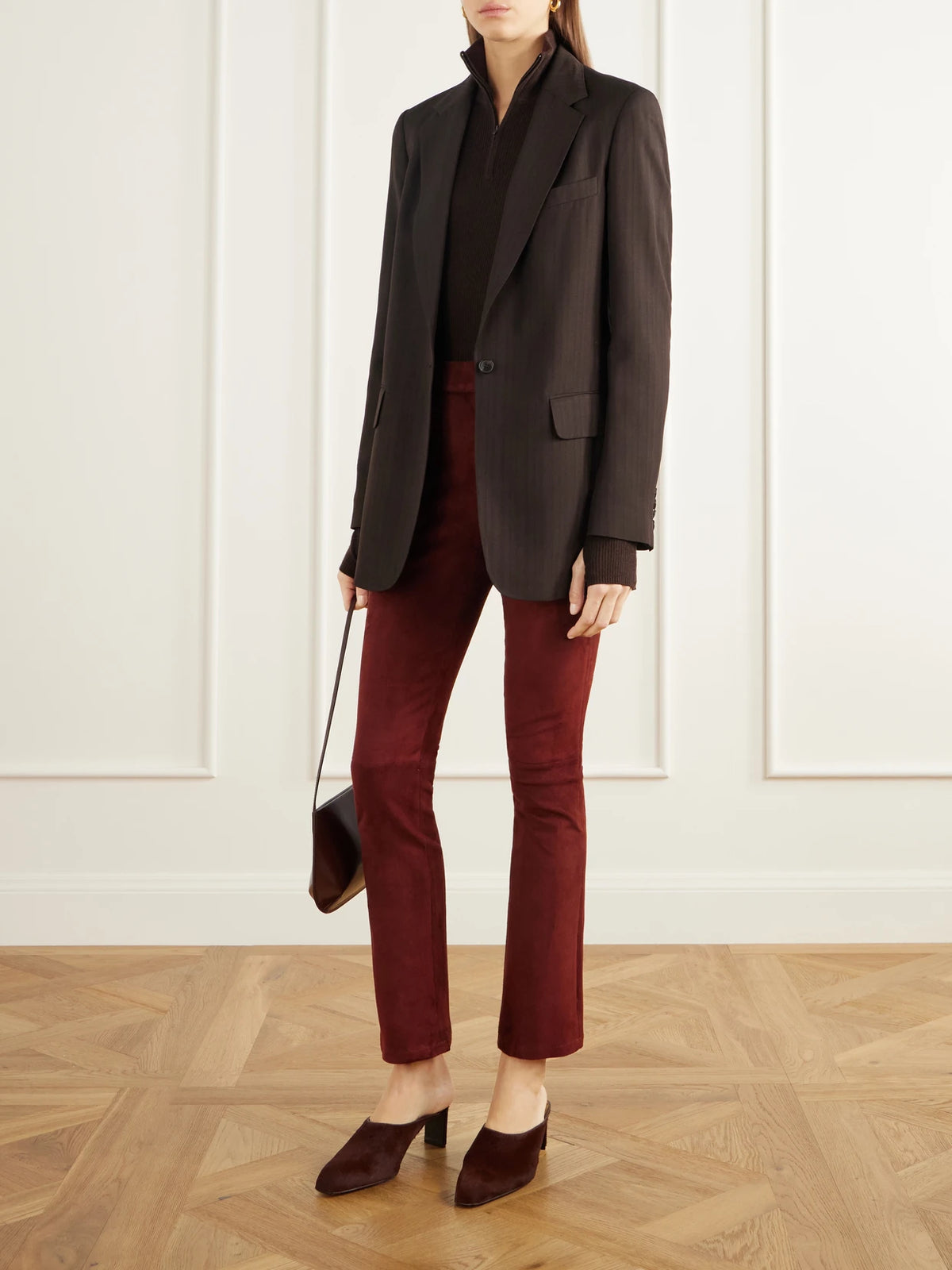 Image of a model wearing Pants. Product name - River Paneled Suede Leggings in Brown colour by brand - ARMA