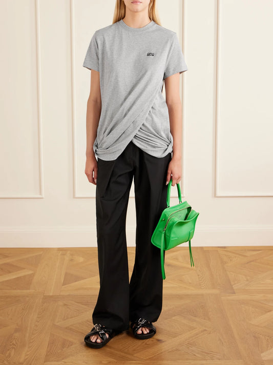 Image of a model wearing Tops. Product name - Anagram-embroidered Draped Cotton-jersey T-shirt in Gray colour by brand - LOEWE