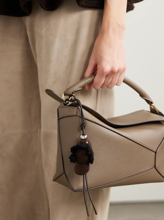 Image of Keychains. Product name - Platypus Wool-felt And Leather Bag Charm in Chocolate colour by brand - LOEWE