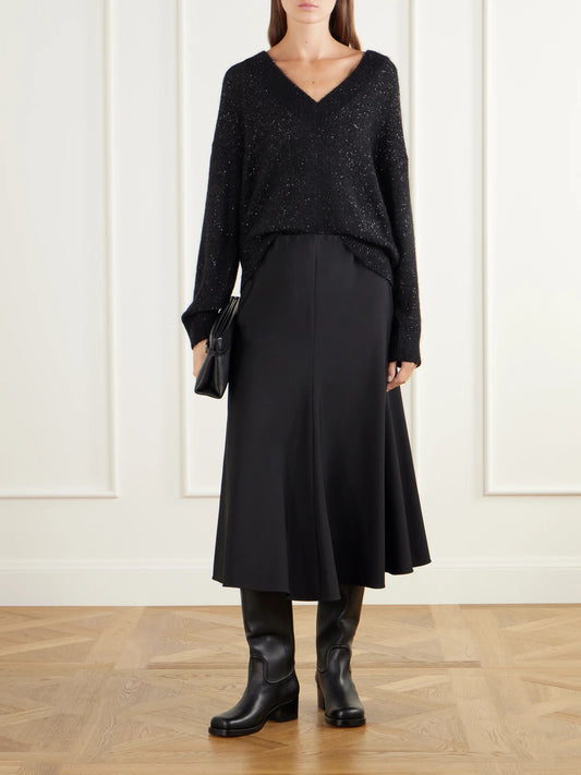 Image of a model wearing Outerwear. Product name - Sequined Rib-trimmed Knitted Sweater in Black colour by brand - Brunello Cucinelli