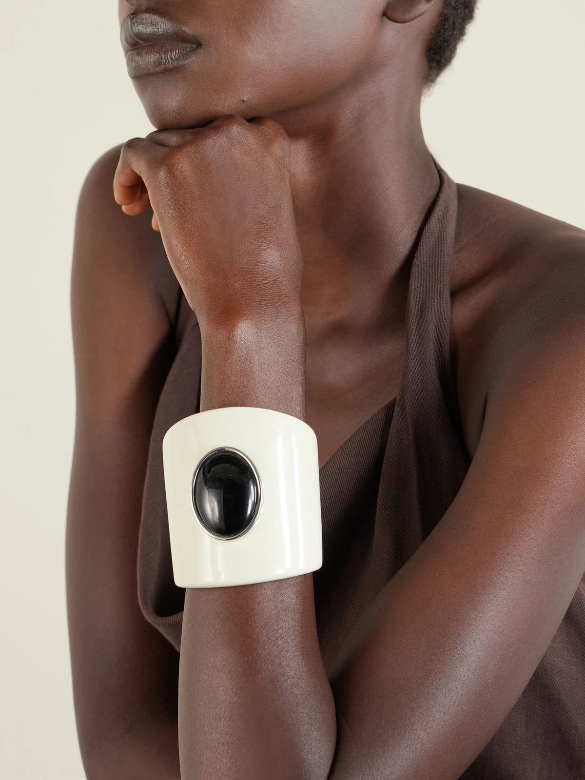 Image of Bracelets. Product name - Nera Rhodium-pleated, Resin And Onyx Cuff in Ivory colour by brand - Julietta