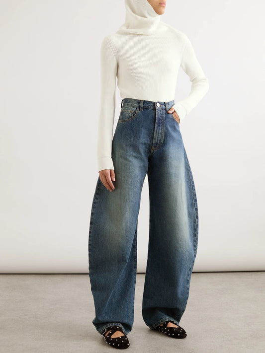 Image of a model wearing Tops. Product name - Hooded Cropped Ribbed Wool-blend Sweater in White colour by brand - Alaïa