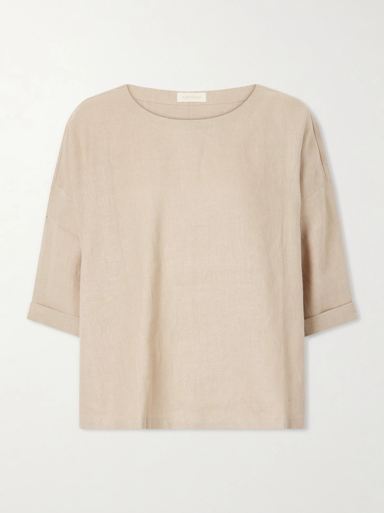 Image of a model wearing Tops. Product name - Saria Linen-chambray T-shirt in Beige colour by brand - Suzie Kondi