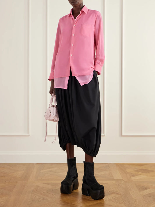 Image of a model wearing Tops. Product name - Layered Georgette Shirt in Pink colour by brand - Comme des Garçons
