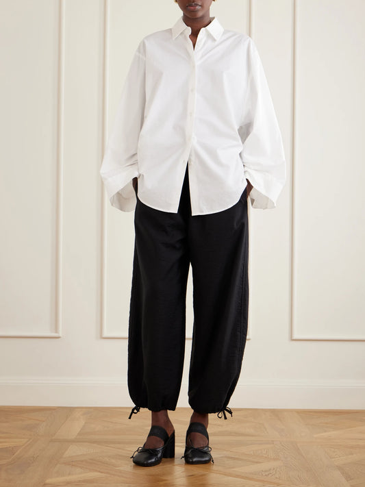 Image of Heels. Product name - Bow-detailed Leather Mules in Black colour by brand - MM6 MAISON MARGIELA