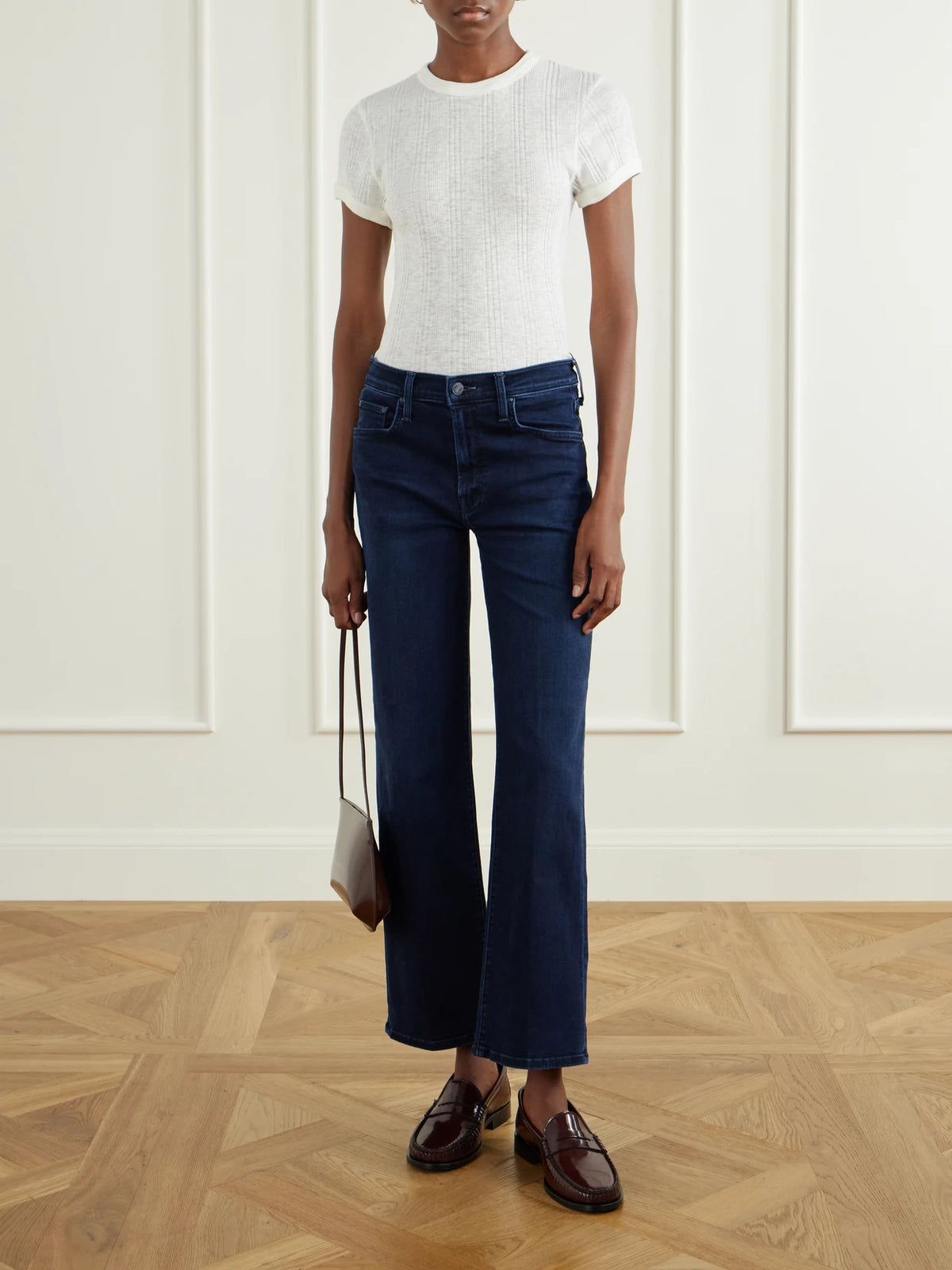Image of a model wearing Tops. Product name - The Itty Bitty Ringer Ribbed Cotton-jersey T-shirt in White, Black colour by brand - Mother