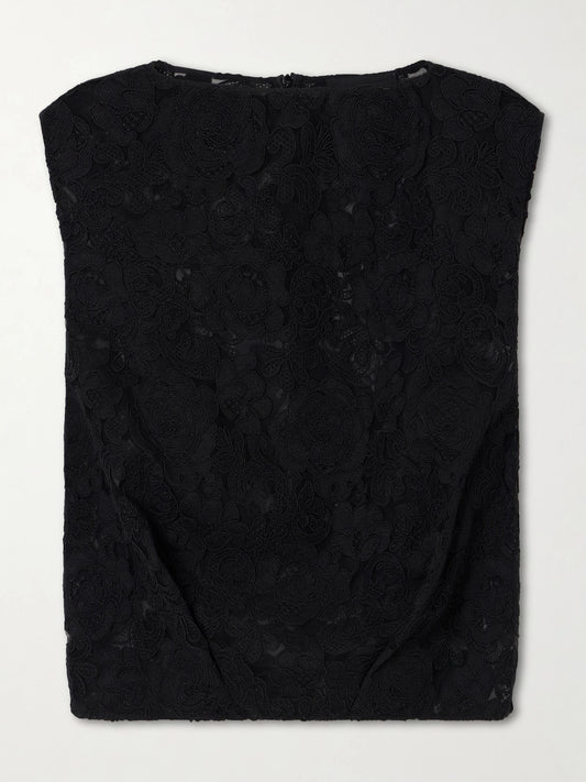 Image of a model wearing Tops. Product name - Cropped Floral-embroidered Lace Blouse in Black colour by brand - Simone Rocha
