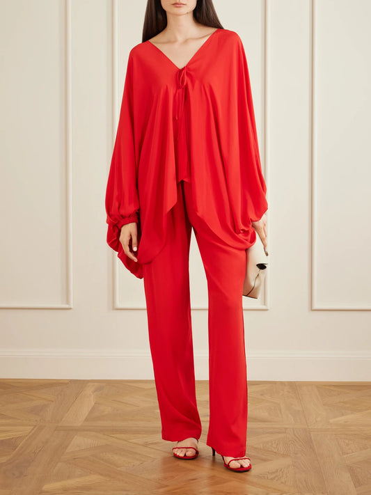 Image of a model wearing Pants. Product name - Tuileries Satin-trimmed Silk-tulle Straight-leg Pants in Red colour by brand - Sharon Wauchob