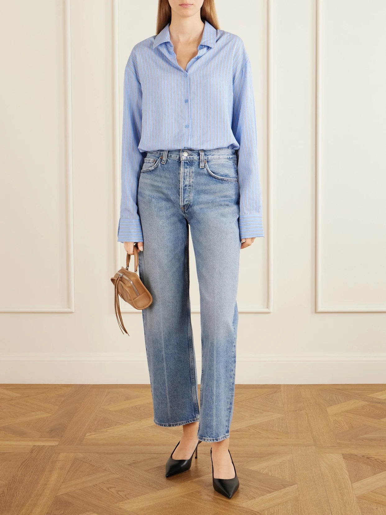 Image of a model wearing Tops. Product name - Peri Oversized Shell Shirt in Blue colour by brand - The Frankie Shop