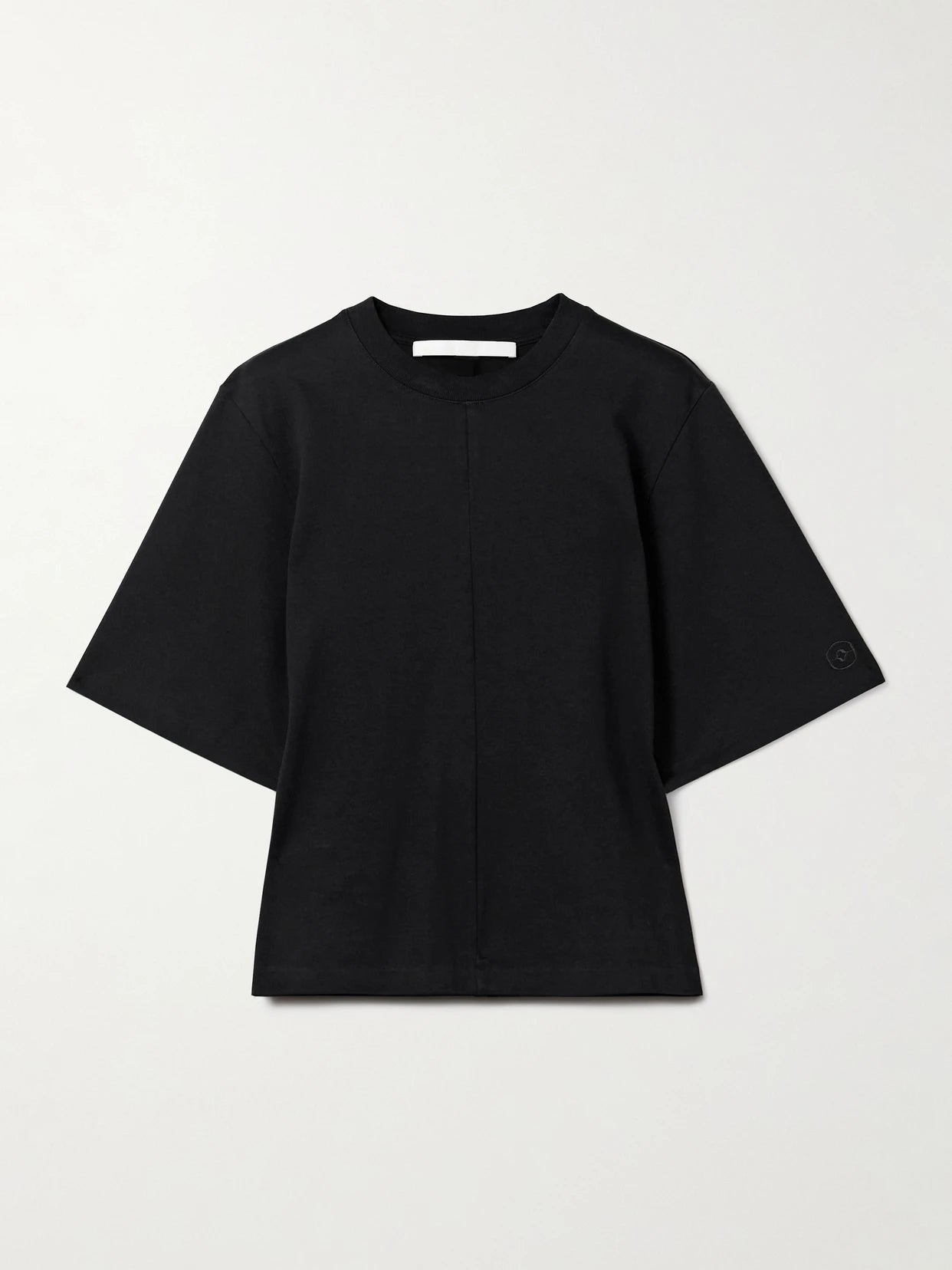 Image of a model wearing Tops. Product name - The Isla Organic Cotton-jersey T-shirt in Black colour by brand - RÙADH