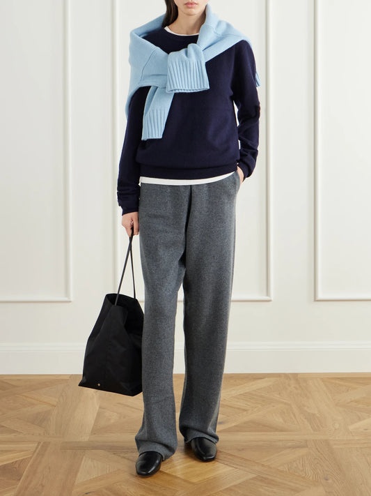 Image of a model wearing Pants. Product name - Rush Cashmere-blend Straight-leg Sweatpants in Dark gray colour by brand - Extreme Cashmere
