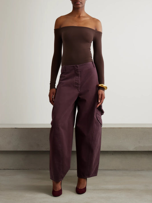 Image of a model wearing Tops. Product name - Off-the-shoulder Stretch-jersey Bodysuit in Brown colour by brand - Alaïa