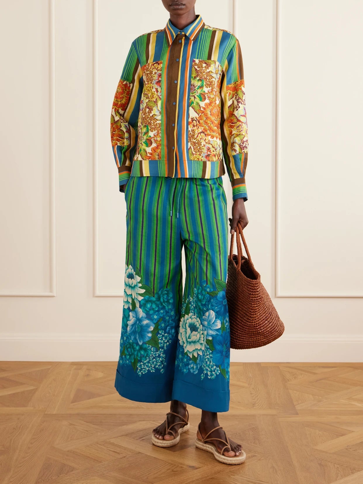 Image of a model wearing Tops. Product name - Charlie Printed Linen Shirt in Multi colour by brand - ALÉMAIS
