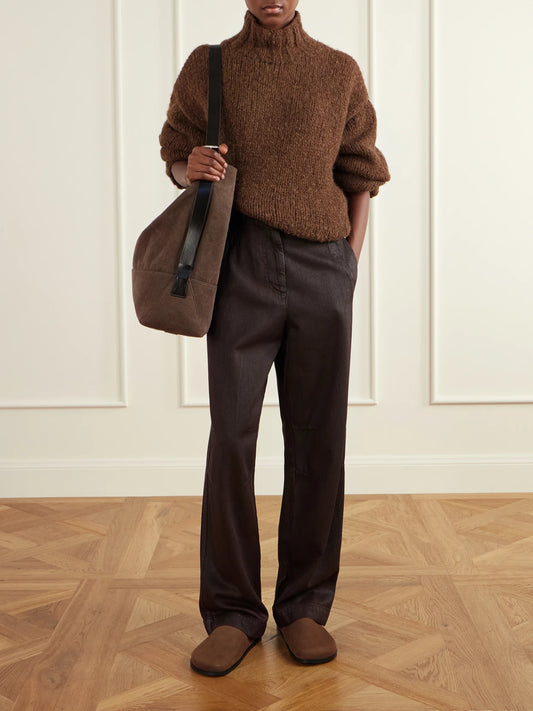 Image of a model wearing Outerwear. Product name - Alpaca, Merino Wool And Cotton-blend Turtleneck Sweater in Brown colour by brand - Lauren Manoogian