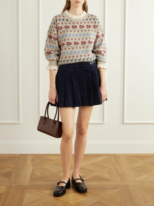 Image of a model wearing Skirts. Product name - Garrett Pleated Stretch-cotton Corduroy Mini Skirt in Navy, Tan colour by brand - Sea