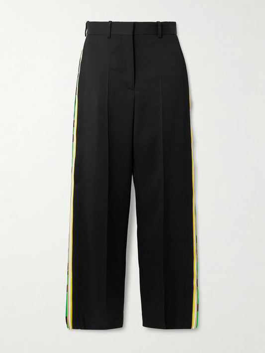 Image of a model wearing Pants. Product name - Striped Wool Straight-leg Pants in Black colour by brand - LOEWE