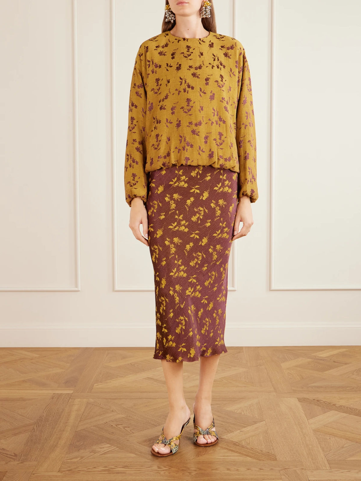 Image of a model wearing Skirts. Product name - Floral-jacquard Cloqué Midi Skirt in Purple colour by brand - Dries Van Noten