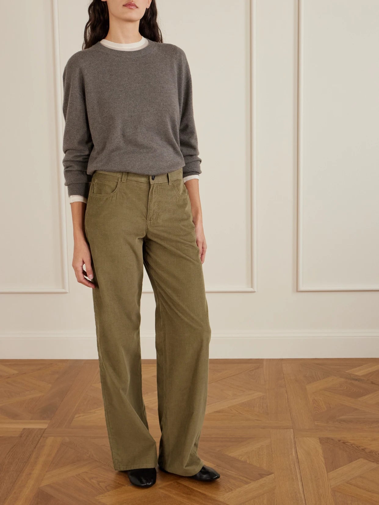Image of a model wearing Pants. Product name - Eglitta Cotton-corduroy Straight-leg Pants in Brown colour by brand - The Row
