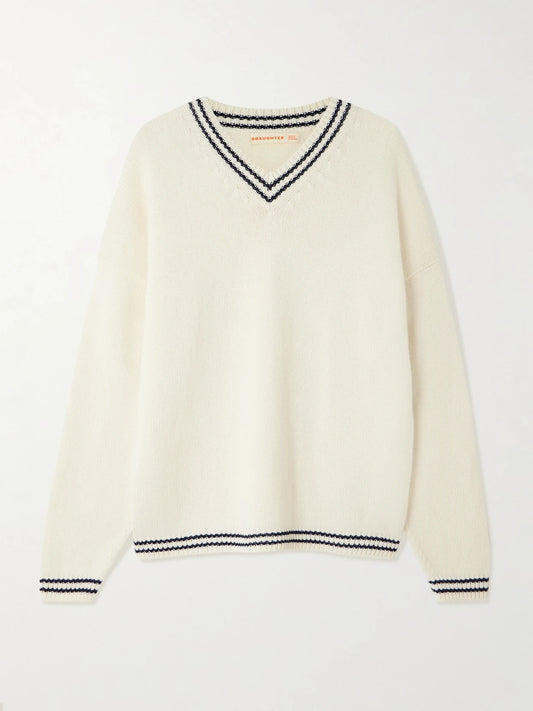 Image of a model wearing Outerwear. Product name - Balla Slouch Striped Wool Sweater in Cream colour by brand - &Daughter