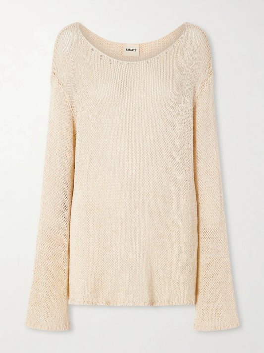 Image of a model wearing Outerwear. Product name - Davet Open-knit Silk And Cotton-blend Sweater in Ivory colour by brand - KHAITE