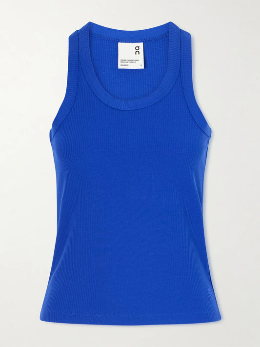 Image of a model wearing Tops. Product name - All-day Ribbed Stretch Lyocell And Cotton-blend Tank in Indigo colour by brand - ON