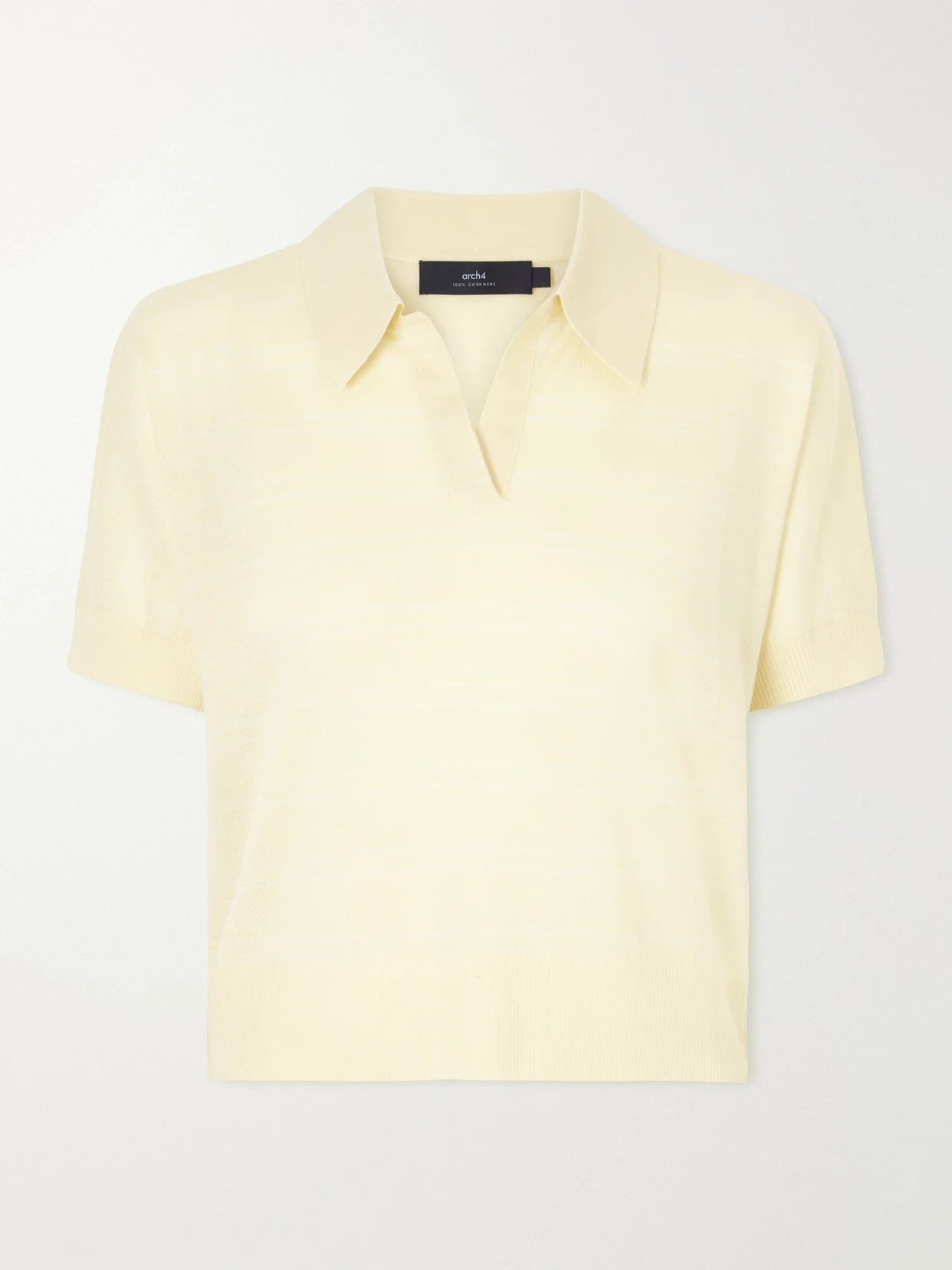 Image of a model wearing Outerwear. Product name - Darya Cashmere Polo Shirt in Yellow colour by brand - Arch4