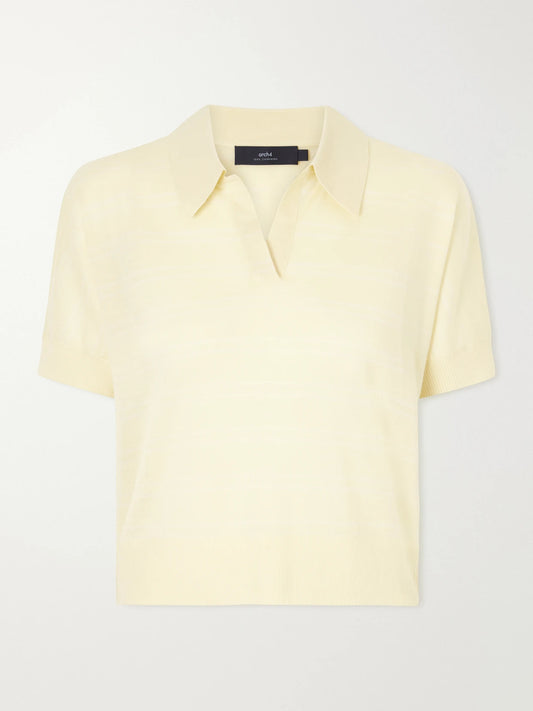 Image of a model wearing Outerwear. Product name - Darya Cashmere Polo Shirt in Yellow colour by brand - Arch4
