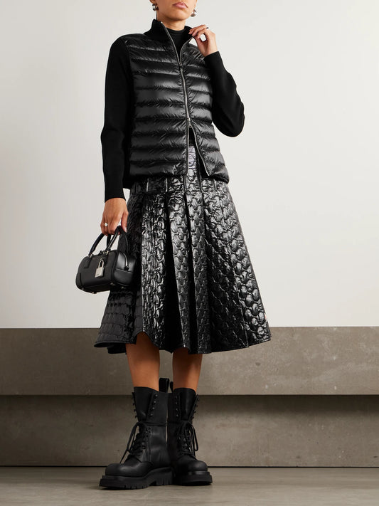 Image of a model wearing Outerwear. Product name - Wool And Quilted Shell Down Cardigan in Black colour by brand - Moncler