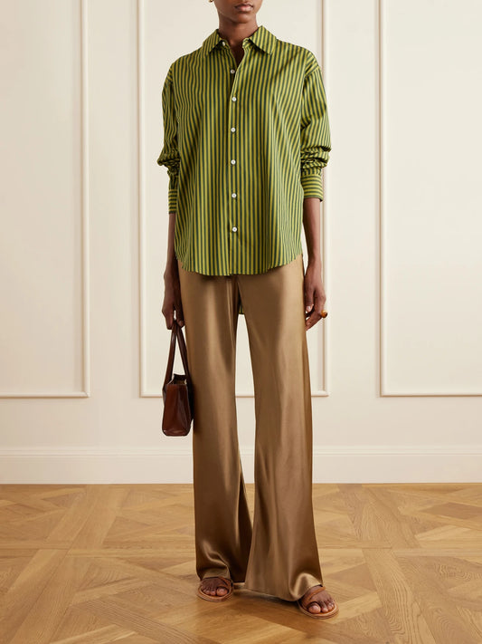 Image of a model wearing Tops. Product name - La Classica Striped Cotton-poplin Shirt in Forest green colour by brand - Comme Si