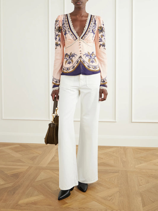 Image of a model wearing Tops. Product name - Liz Floral-print Lace-trimmed Crepe De Chine Blouse in Pink colour by brand - Farm Rio