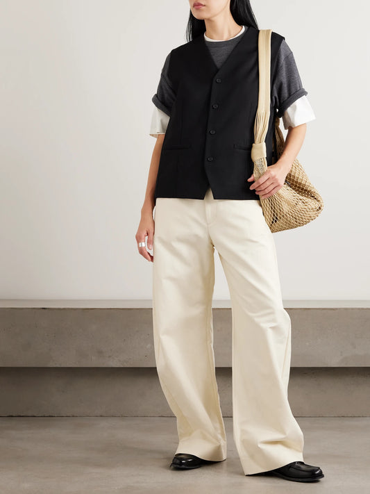 Image of a model wearing Tops. Product name - Ribbed Wool T-shirt in Dark gray colour by brand - ssstein