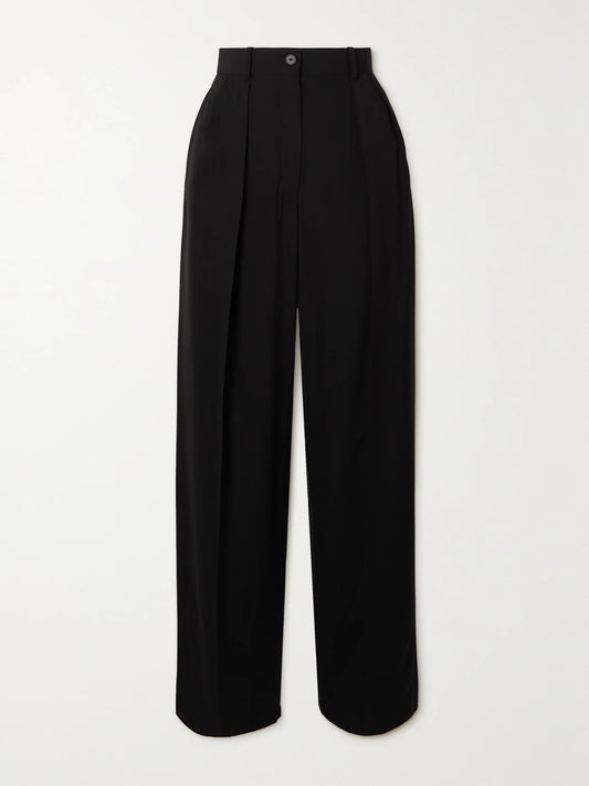Image of a model wearing Pants. Product name - Essentials Igor Crepe Straight-leg Pants in Black colour by brand - The Row