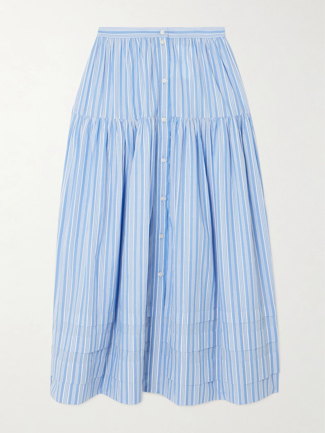 Image of a model wearing Skirts. Product name - Marceline Tiered Striped Organic Cotton Midi Skirt in Blue colour by brand - DÔEN