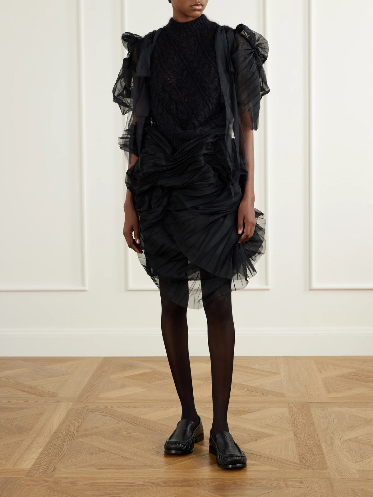 Image of a model wearing Tops. Product name - Francisca Tulle-trimmed Mohair-blend Sweater in Black colour by brand - Pauline Dujancourt