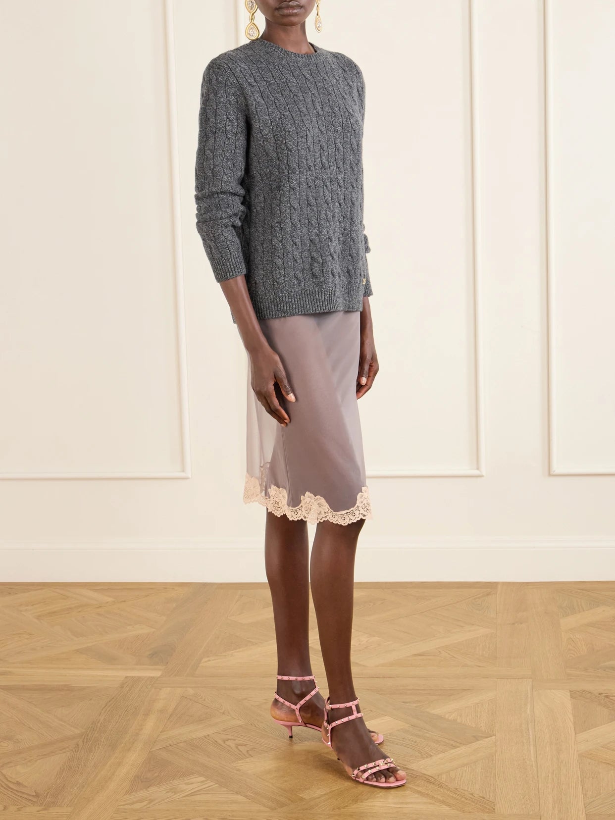Image of a model wearing Skirts. Product name - Lace-trimmed Mesh Midi Skirt in Gray colour by brand - Valentino Garavani