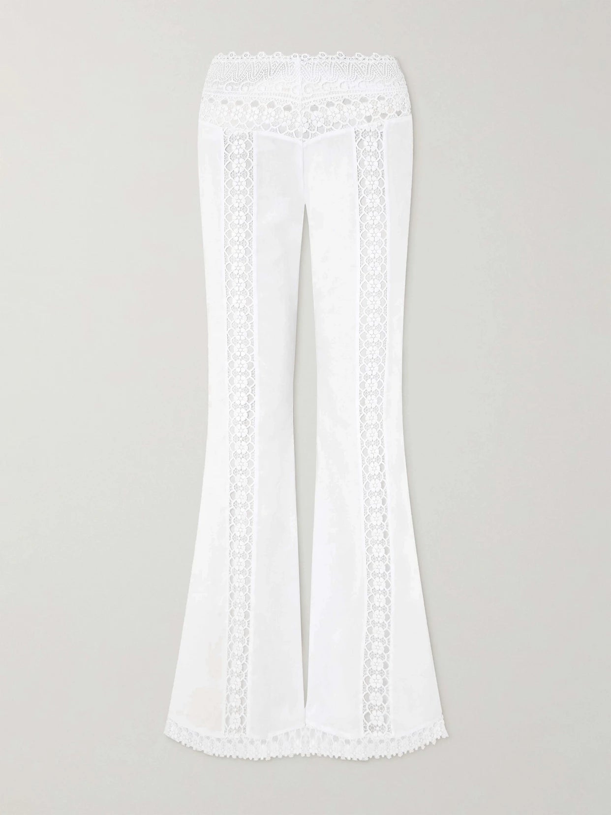 Image of a model wearing Pants. Product name - Vianora Cotton-blend Wide-leg Pants in White colour by brand - Charo Ruiz