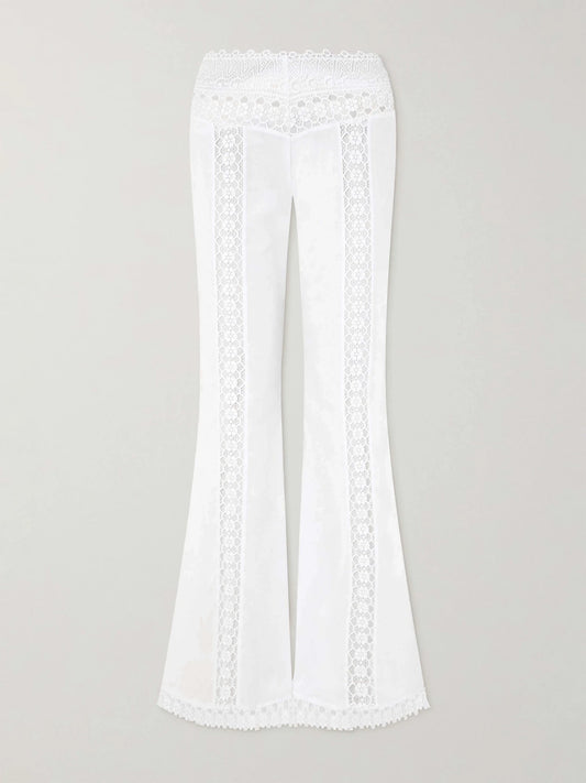 Image of a model wearing Pants. Product name - Vianora Cotton-blend Wide-leg Pants in White colour by brand - Charo Ruiz
