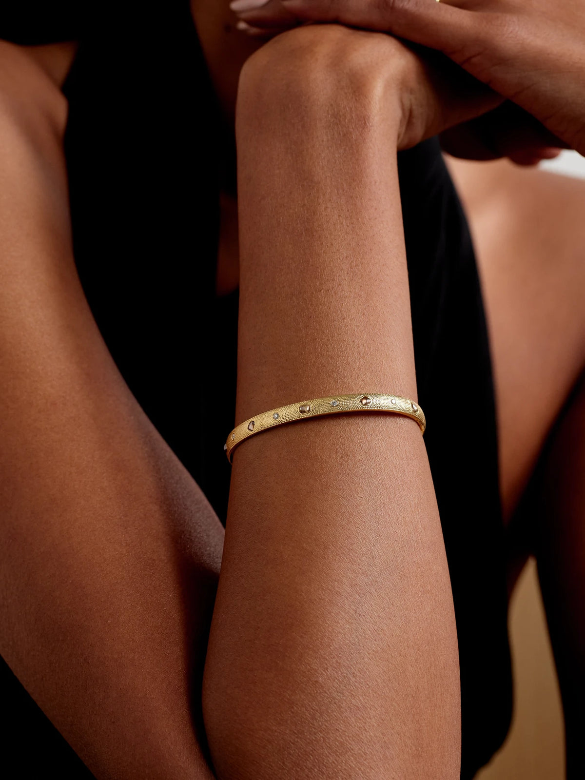 Image of Bracelets. Product name - Talisman 18-karat Gold Diamond Bangle in Multi colour by brand - De Beers London