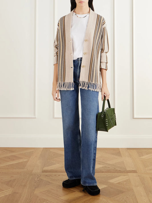 Image of a model wearing Outerwear. Product name - Handloom Fringed Striped Wool And Cashmere-blend Cardigan in Multi, Red colour by brand - Guest In Residence