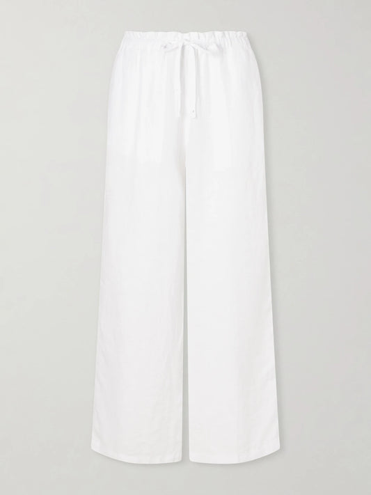 Image of a model wearing Pants. Product name - Linen Straight-leg Pants in White colour by brand - James Perse