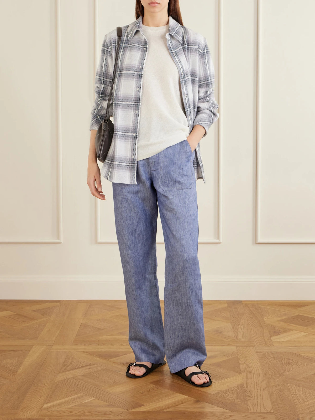 Image of a model wearing Tops. Product name - Cloud Light Tartan Cashmere Shirt in Blue colour by brand - God's True Cashmere