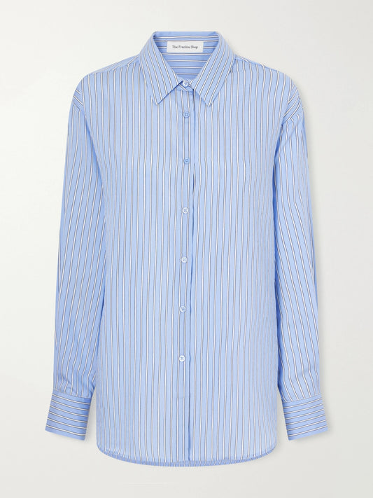 Image of a model wearing Tops. Product name - Peri Oversized Shell Shirt in Blue colour by brand - The Frankie Shop