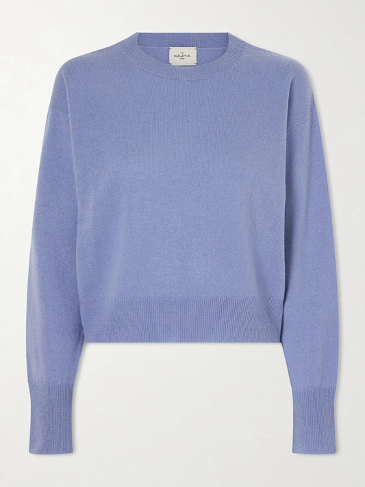 Image of a model wearing Outerwear. Product name - Menorca Cropped Cashmere Sweater in Blue colour by brand - Le Kasha